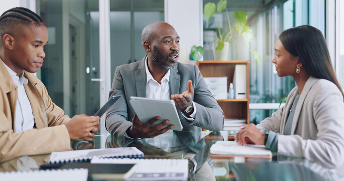 African logistics professionals discussing industry-specific operations